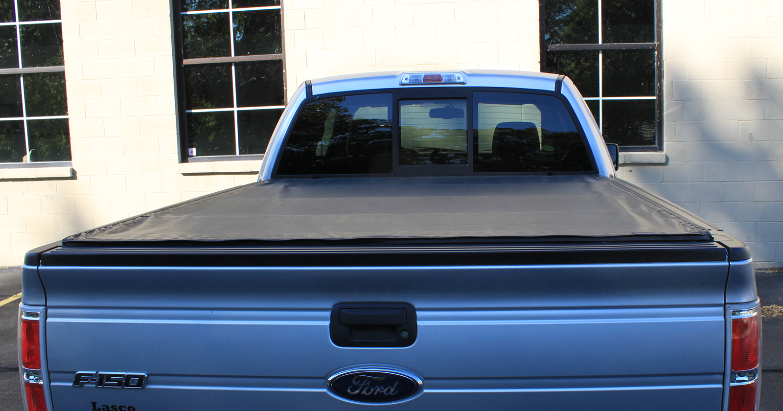 Truck Bed Cover on Blue Truck
